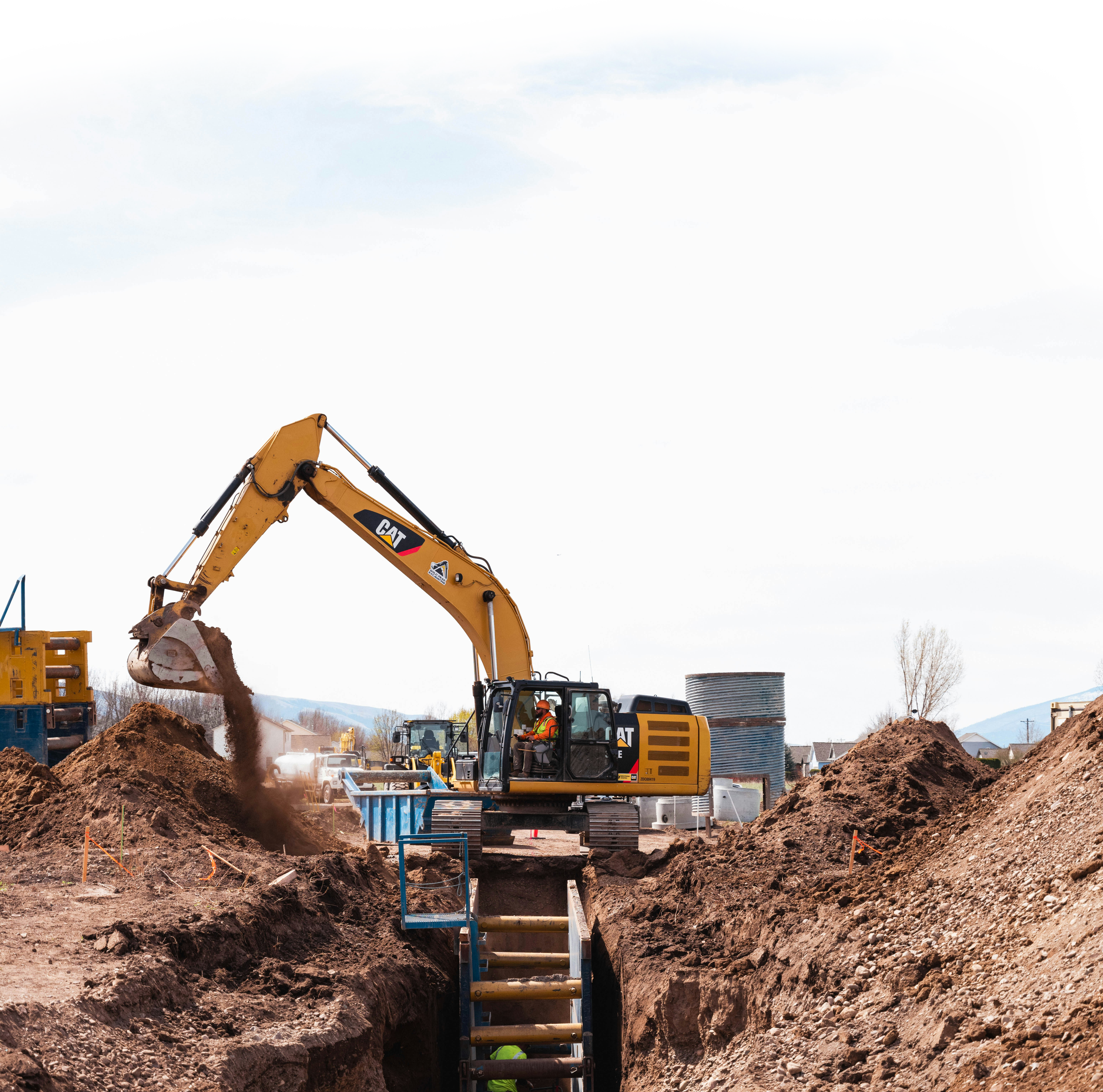 Imagen de fondo de un Tractor excavando.